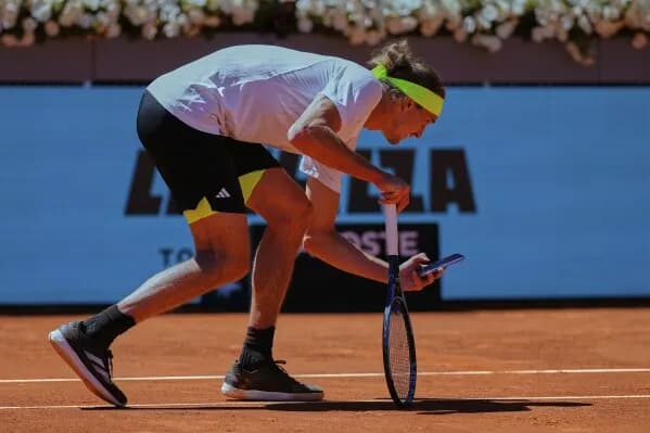Zverev gets a warning for taking photo of ball mark at Madrid Open